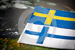 Flags of sweden and finland, economic and military pact and cooperation concept