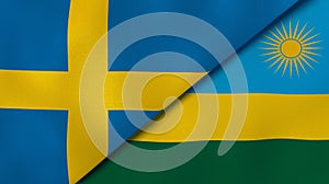 The flags of Sweden and Rwanda. News, reportage, business background. 3d illustration photo