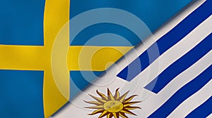 The flags of Sweden and Uruguay. News, reportage, business background. 3d illustration