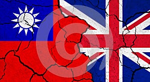 Flags of Taiwan and United Kingdom on cracked surface