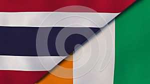 The flags of Thailand and Ivory Coast. News, reportage, business background. 3d illustration