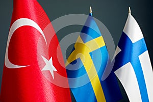 Flags of Turkey, Sweden and Finland as diplomatic relations.