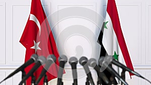 Flags of Turkey and Syria at international meeting or negotiations press conference