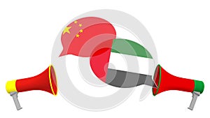 Flags of UAE and China on speech balloons from megaphones. Intercultural dialogue or international talks related 3D