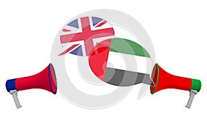 Flags of the UAE and the United Kingdom on speech balloons from megaphones. Intercultural dialogue or international