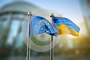 Flags of Ukraine and European Union against EU parliament