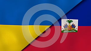 The flags of Ukraine and Haiti. News, reportage, business background. 3d illustration