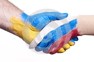 Flags of Ukraine and Russia Flag on hands isolated on white background. Concept of political, economical, social aggressions,