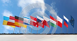 Flags under blue sky