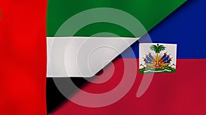 The flags of United Arab Emirates and Haiti. News, reportage, business background. 3d illustration