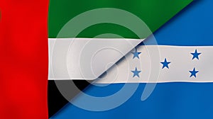 The flags of United Arab Emirates and Honduras. News, reportage, business background. 3d illustration