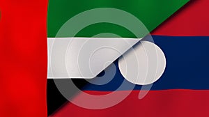 The flags of United Arab Emirates and Laos. News, reportage, business background. 3d illustration