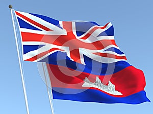 The flags of United Kingdom and Cambodia on the blue sky. For news, reportage, business. 3d illustration