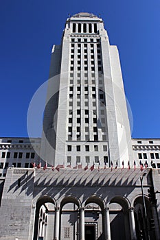 Flags of the United States of America over the entrance to the city hall in Downtown Los Angeles.