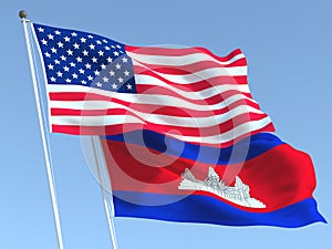 The flags of United States and Cambodia on the blue sky. For news, reportage, business. 3d illustration