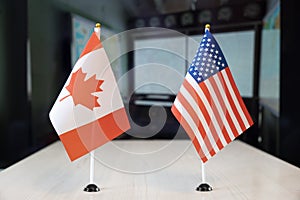 flags of United States and Canada. international negotiations. conclusion of contracts between countries. concept of communication photo