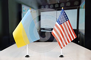 flags of United States and ukraine. international negotiations. conclusion of contracts between countries. concept of photo