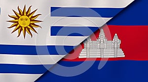 The flags of Uruguay and Cambodia . News, reportage, business background. 3d illustration