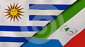 The flags of Uruguay and Equatorial Guinea. News, reportage, business background. 3d illustration