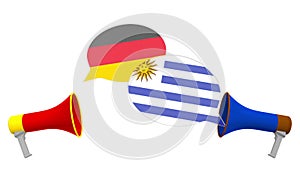 Flags of Uruguay and Germany on speech bubbles with loudspeakers. Intercultural dialogue or international talks related