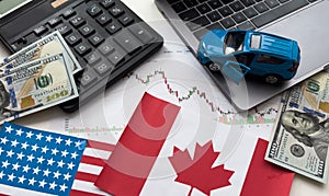 flags of the USA and Canada, dollars, charts