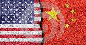 Flags of USA and China painted on cracked wall background/USA-China trade war concept