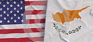 Flags of USA and Cyprus. Linen flag close-up. Flag made of canvas. United States of America. Cyprian. State national symbols. 3d