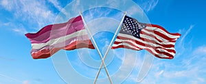 flags USA and Lesbian Pride waving in the wind on flagpole against the sky with clouds on sunny day. 3d illustration