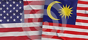 Flags of USA and Malaysia. Linen flag close-up. Flag made of canvas. United States of America. Kuala Lumpur. State national