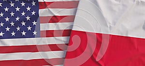 Flags of USA and Poland. Linen flag close-up. Flag made of cloth. United States. Polish. National symbols. 3d illustration