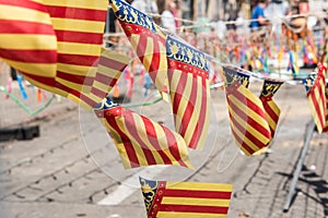 Flags of the Valencian community next to the mascleta prepared for the fallas photo