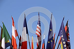 Flags of various countries with blue sky as background