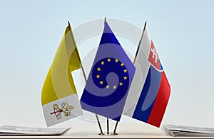 Flags of Vatican City European Union and Slovakia