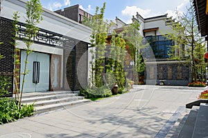 Flagstone-paved street in Chinese traditional buildings on sunny