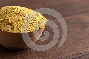 Flakes of Yellow Nutritional Yeast a Cheese Substitute and Seasoning for Vegan Diets