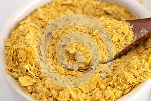 Flakes of Yellow Nutritional Yeast a Cheese Substitute and Seasoning for Vegan Diets