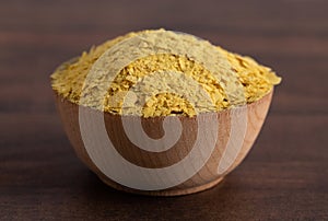 Flakes of Yellow Nutritional Yeast a Cheese Substitute and Seasoning for Vegan Diets