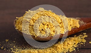 Flakes of Yellow Nutritional Yeast a Cheese Substitute and Seasoning for Vegan Diets