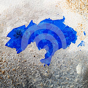 Flaking paint on a decaying surface