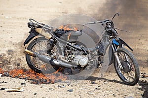 Flame burned motorcycle from explosive in forensic training