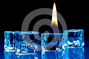 Flame burning on blue ice cubes