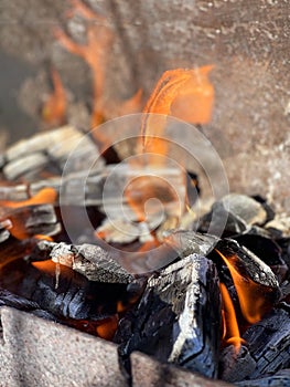 A flame burning in a brazier photo