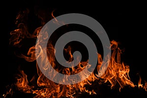 Flame fires. Burn lights on a black background. Fire flames on black background. Abstract fire flame background.