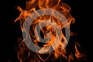 Flame fires. Burn lights on a black background. Fire flames on black background. Abstract fire flame background.