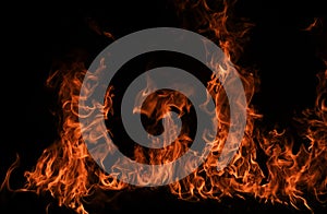 Flame fires. Burn lights on a black background. Fire flames on black background. Abstract fire flame background.