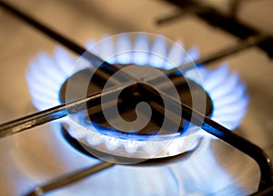 Flame on a gas-burner. Shallow depth of field. Toned