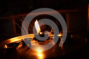 Flame light prayer devotional dark background