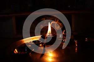 Flame light prayer devotional dark background