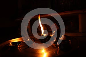 Flame light prayer devotional dark background