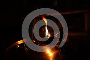 Flame light prayer devotional dark background